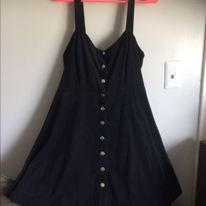 Black button skater dress